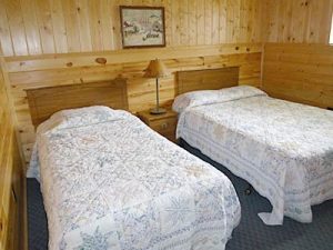 Cedar Rapids Lodge Cabin 10 double bedroom